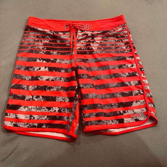 The North Face Swimming Trunks - red and black - nylon mesh - size 36 waist